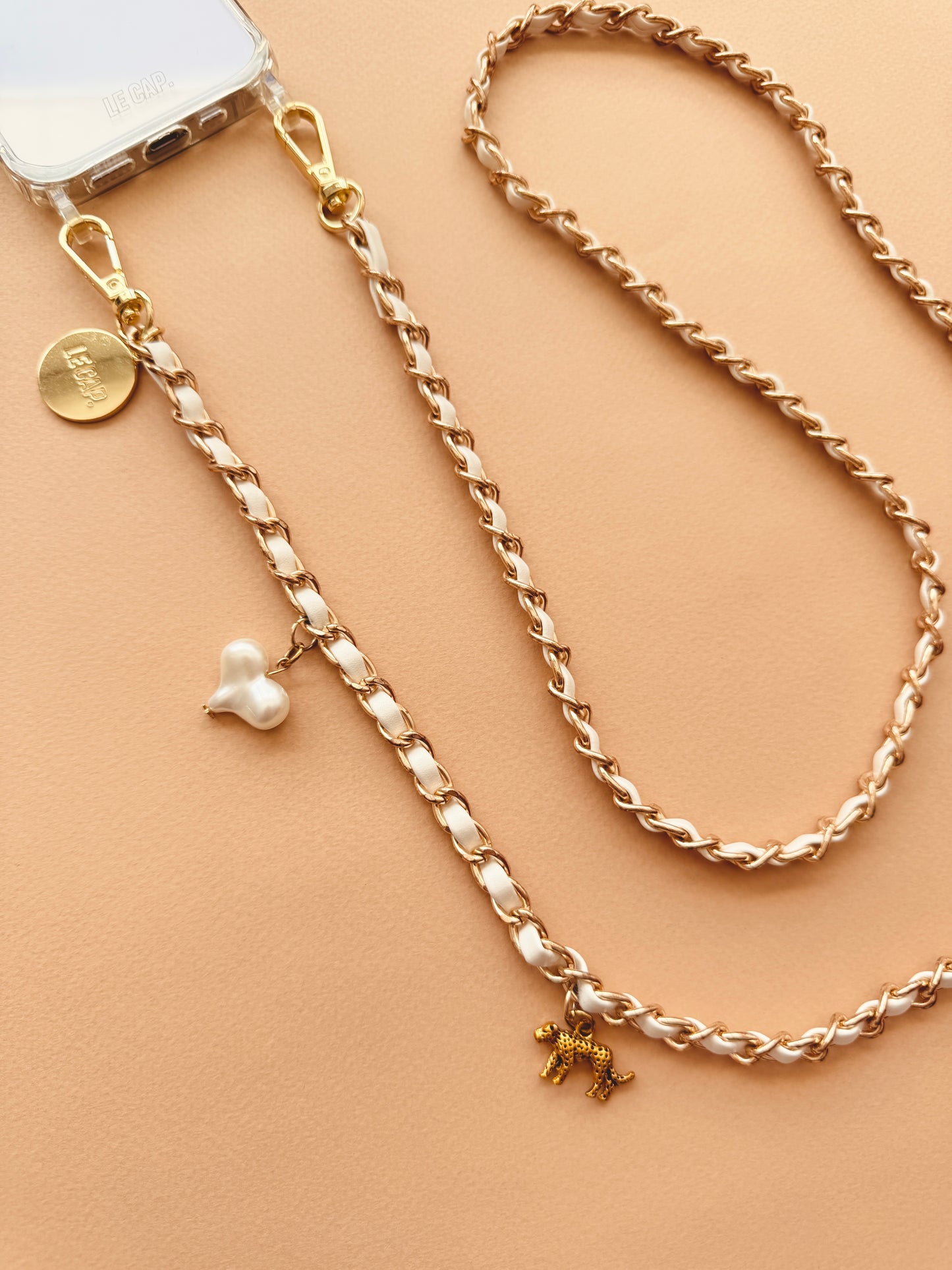 Le Cap Crossbody Phone Chain cream with charms
