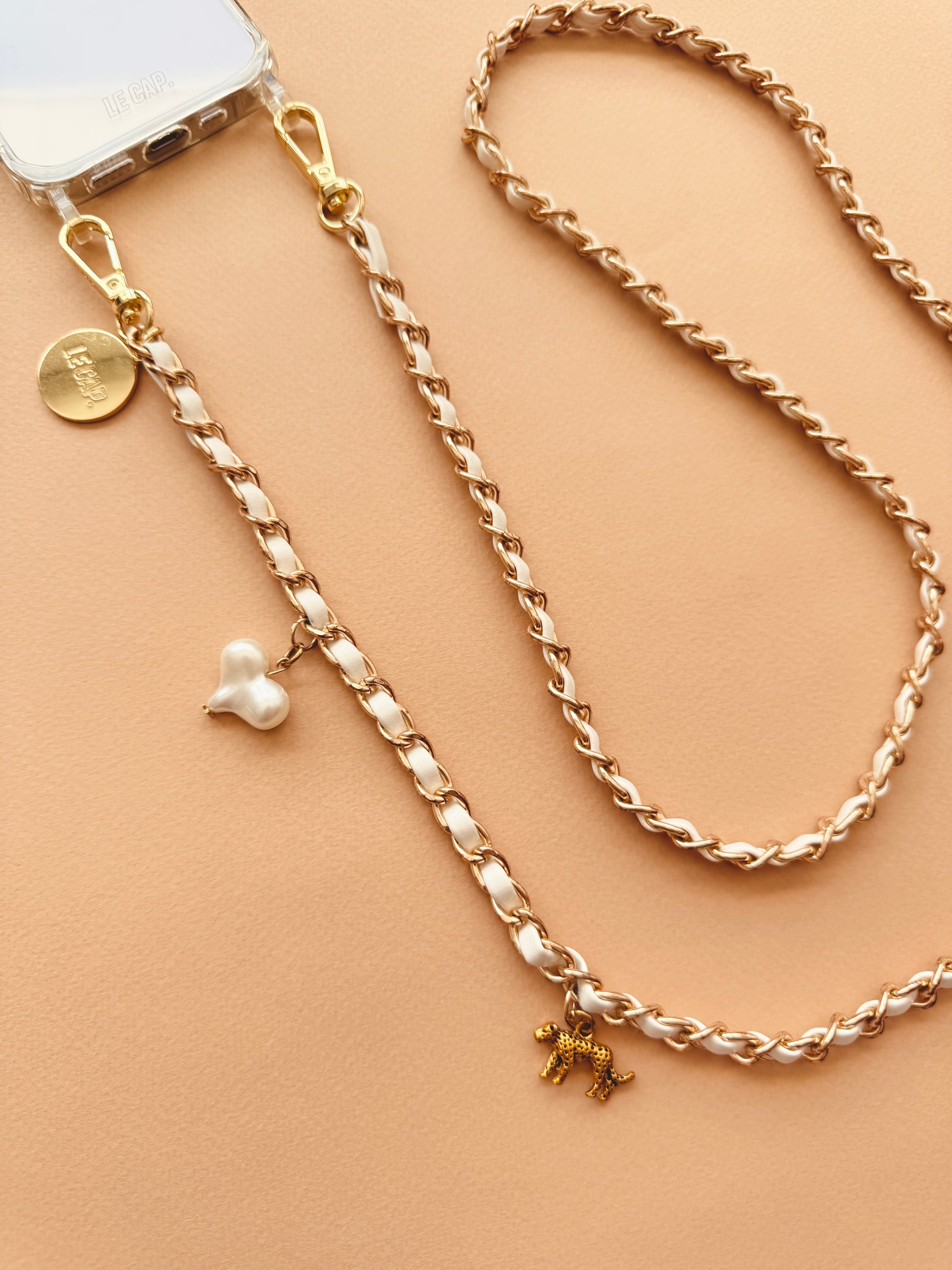 Le Cap Crossbody Phone Chain cream with charms