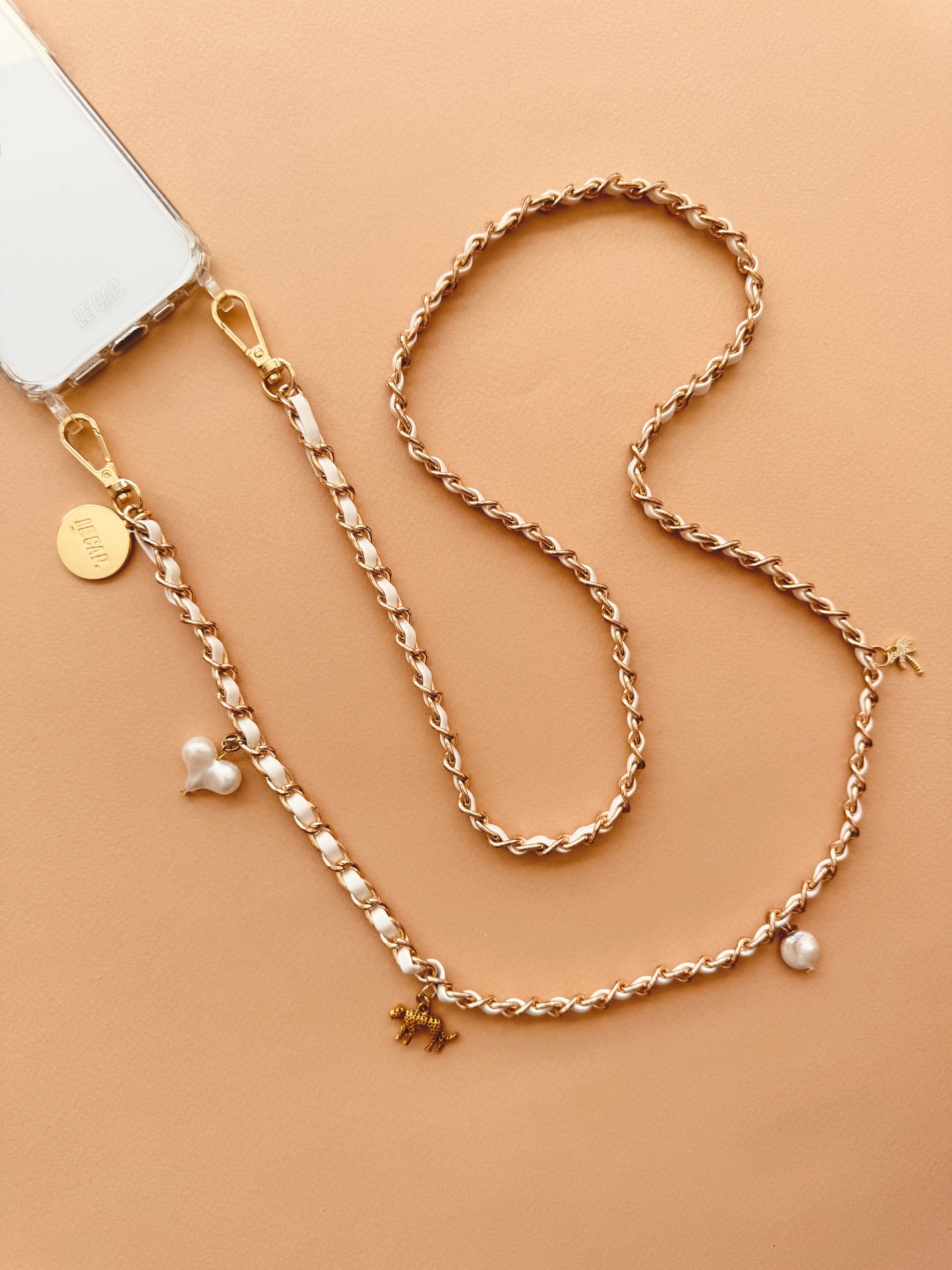 Le cap crossbody phone chain cream with charms